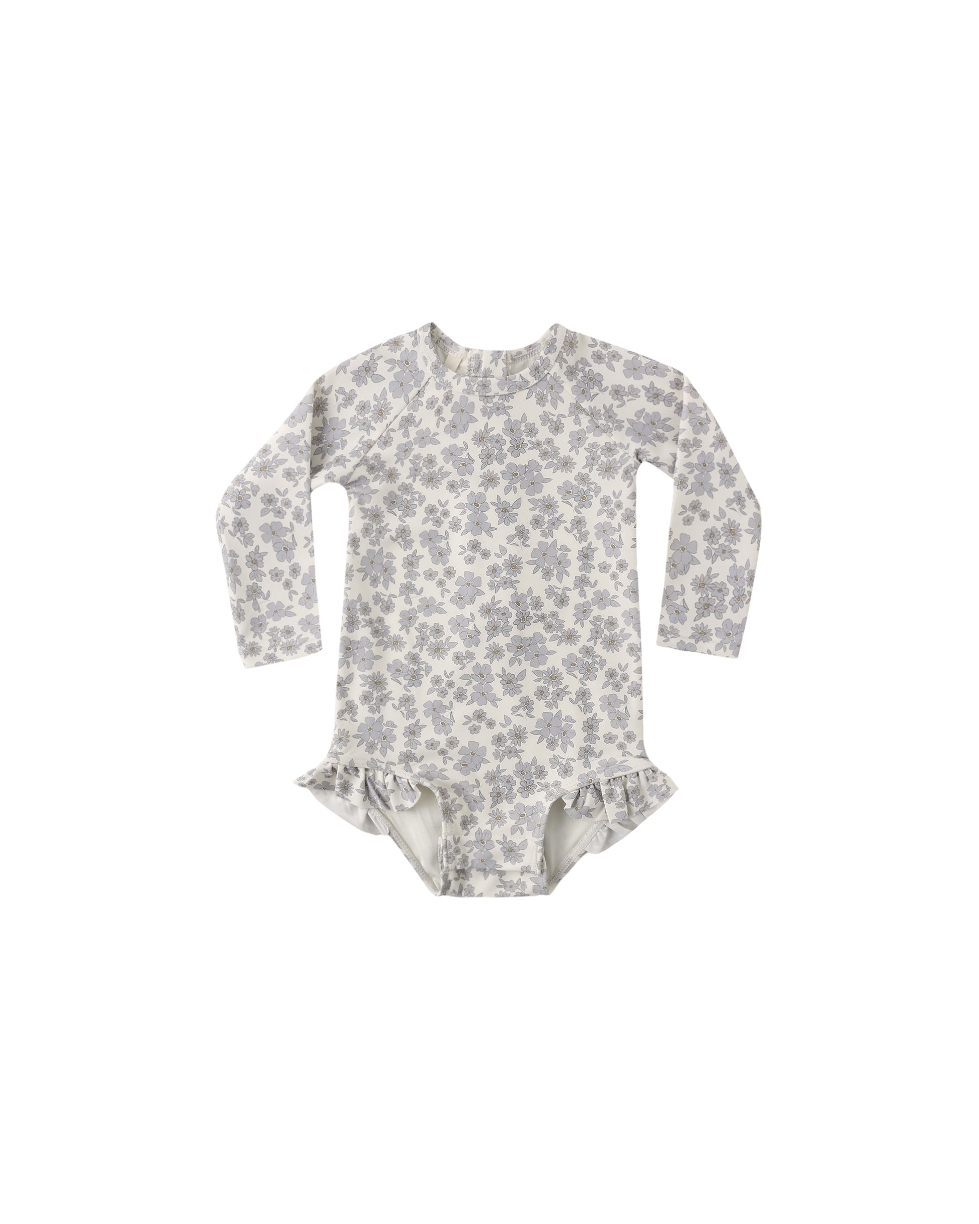 Blue floral Olivia rashguard one-piece swimsuit by Quincy Mae, featuring a vibrant floral pattern and long sleeves for sun protection.