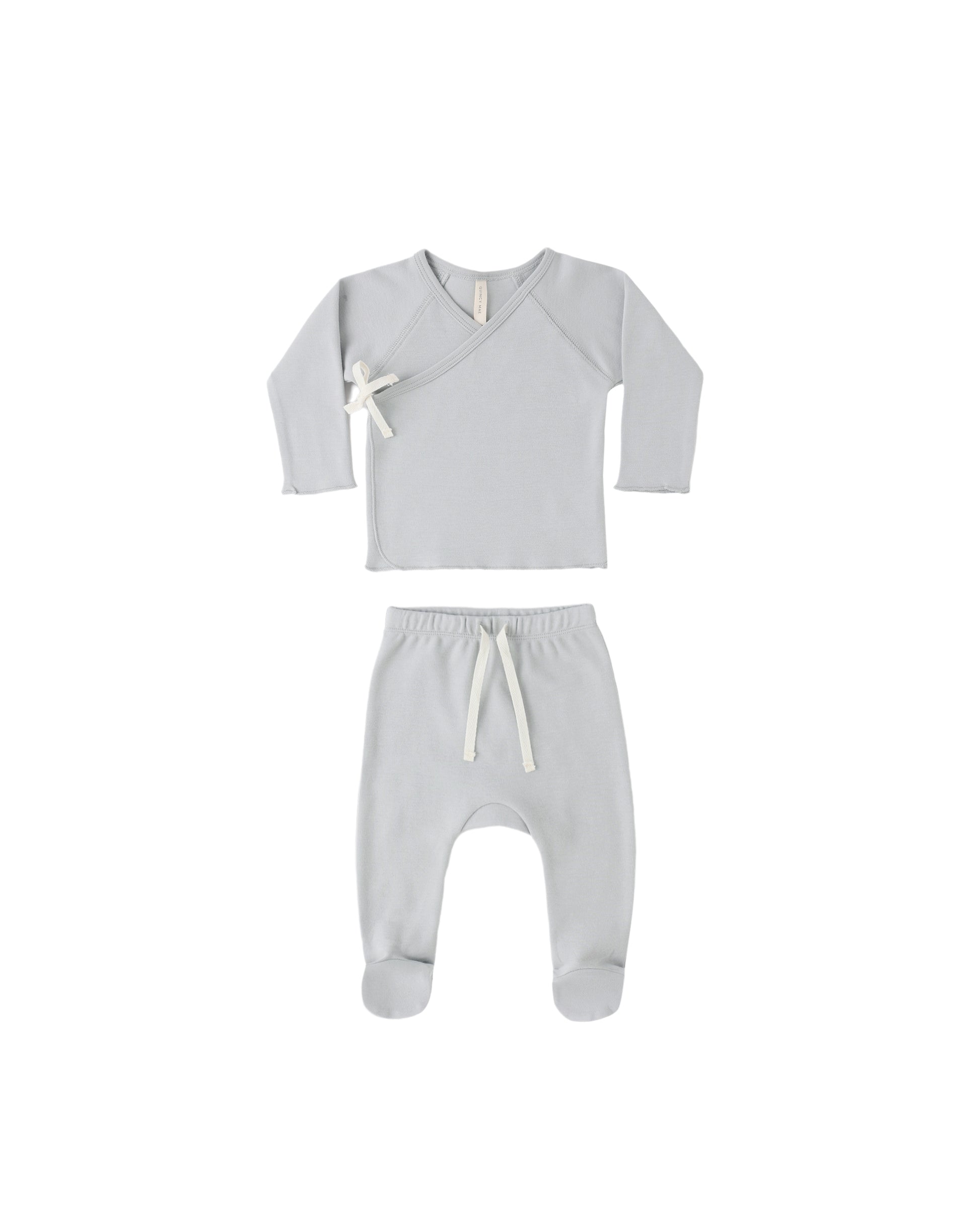 Quincy Mae Sky Wrap Top and Footed Pant set in soft fabric, featuring a wrap design and cozy footed pants for babies.