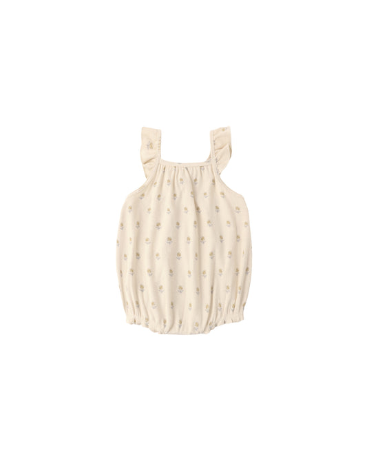 Ecru Buttercup Ribbed Ruffle Romper for babies by Quincy Mae, featuring ribbed fabric and ruffle details.