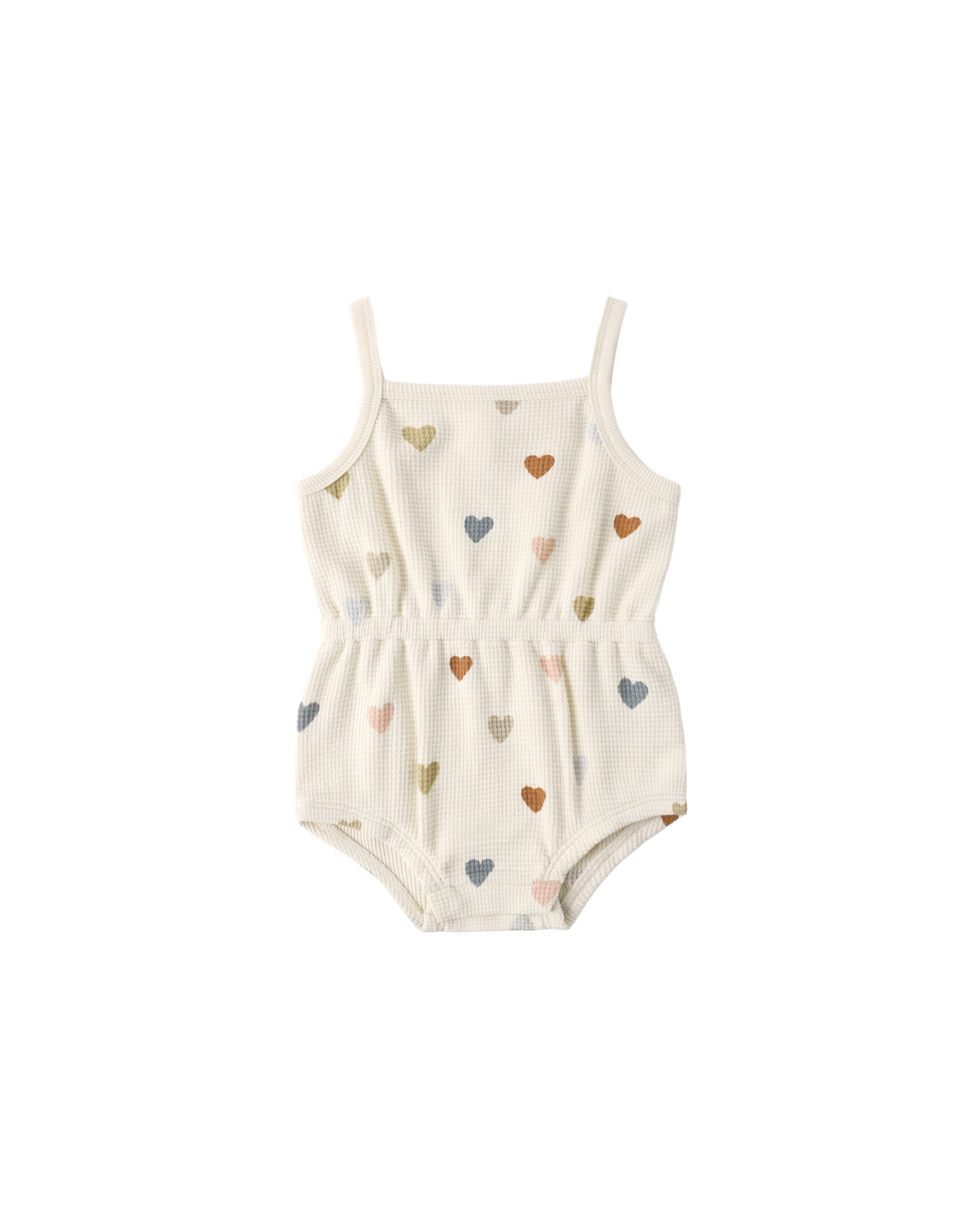 Natural-colored Quincy Mae confetti hearts waffle cinch romper for babies, featuring a soft, textured fabric and a comfy cinched waist.