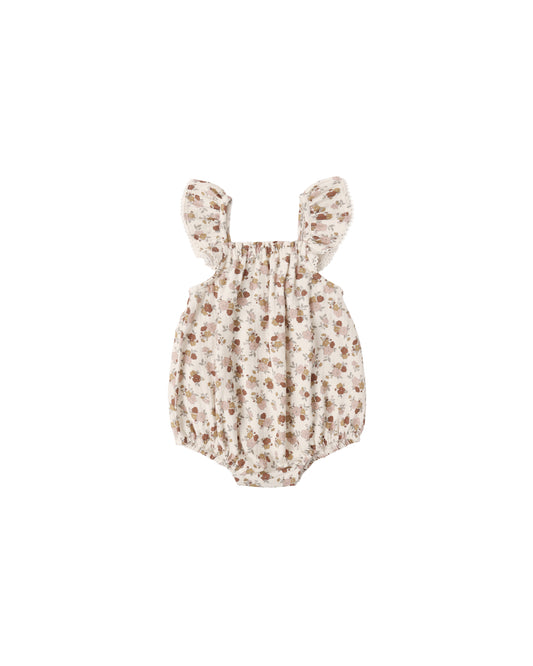 Natural-colored Bloom Bonnie romper for babies by Quincy Mae, featuring soft fabric and comfortable fit.