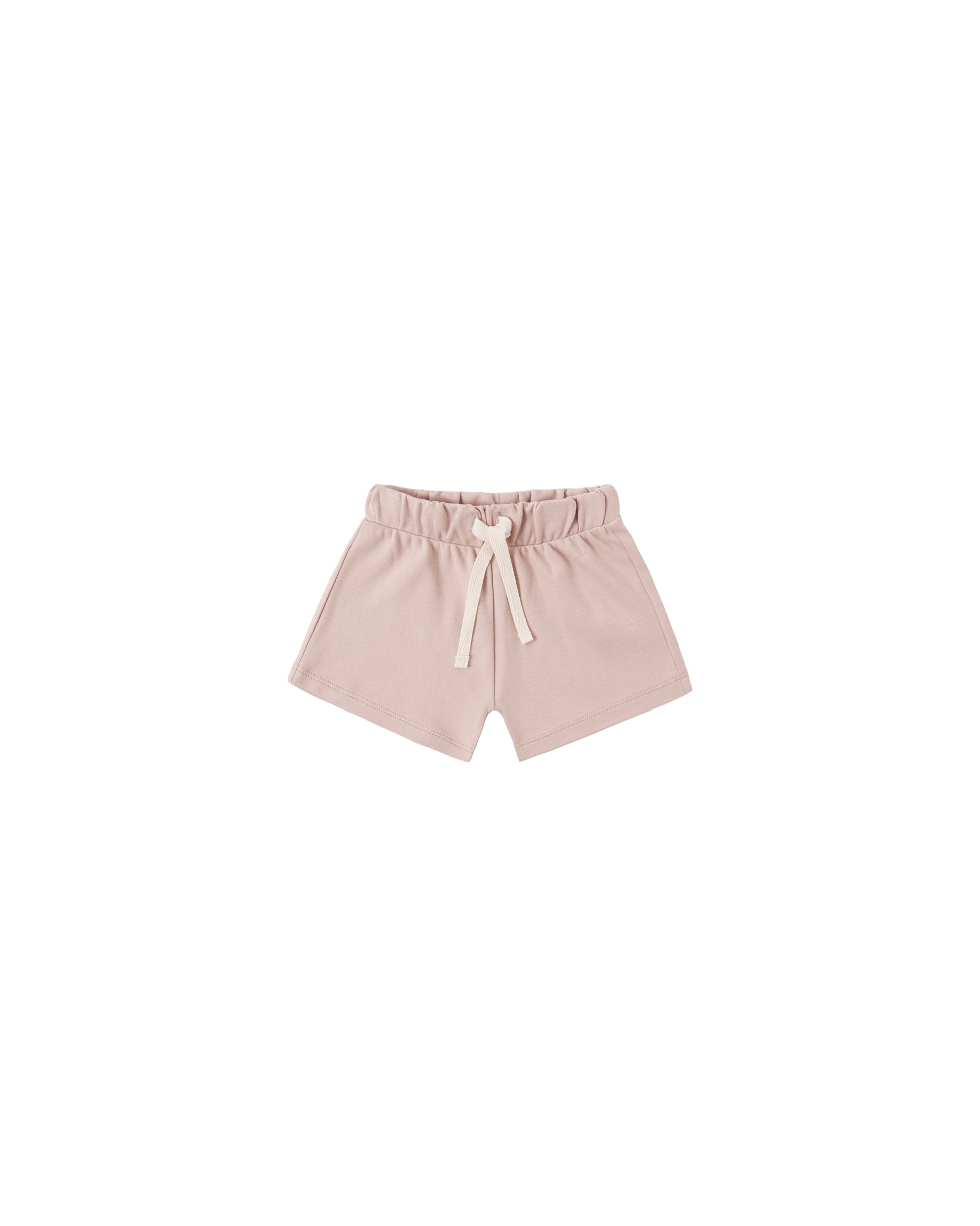 Quincy Mae Blush Play Shorts for kids, soft pink cotton shorts with elastic waistband, laid flat on a white background.