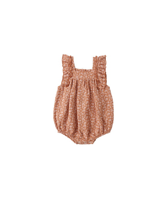 Quincy Mae Poppy Floral Maya Romper featuring a colorful floral pattern, soft fabric, and comfortable fit for babies and toddlers.