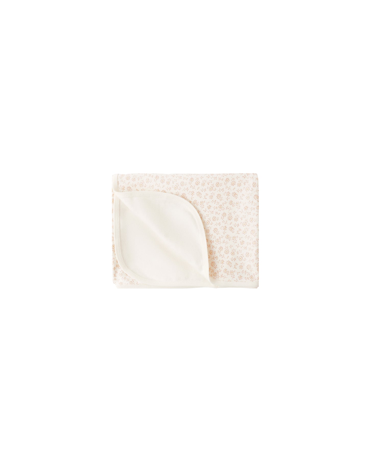 Cream-colored Ditsy Swaddle by Quincy Mae featuring a delicate floral pattern, soft and breathable fabric for newborn comfort.