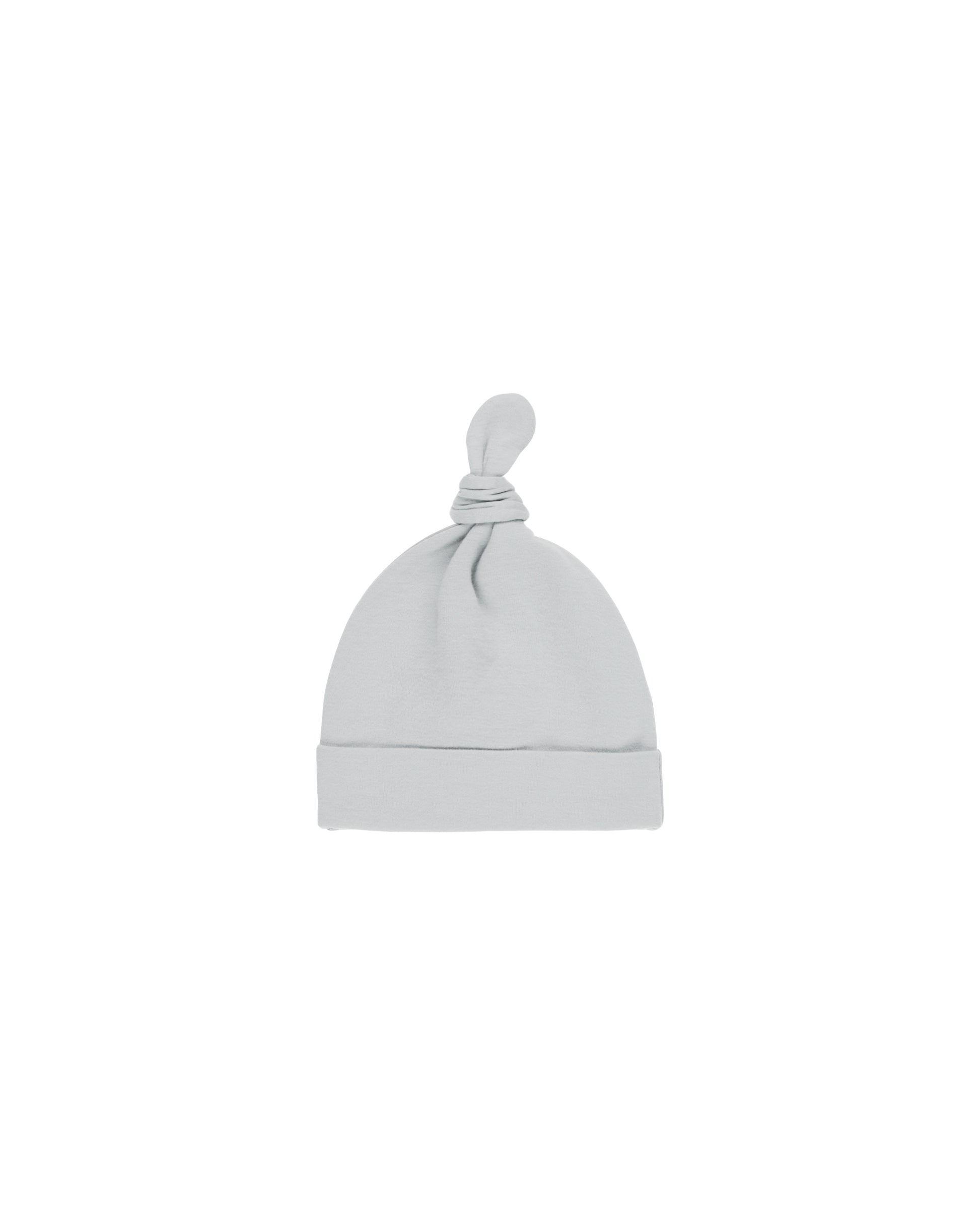 Sky knotted baby hat by Quincy Mae featuring soft fabric and a stylish knot design for cozy comfort.