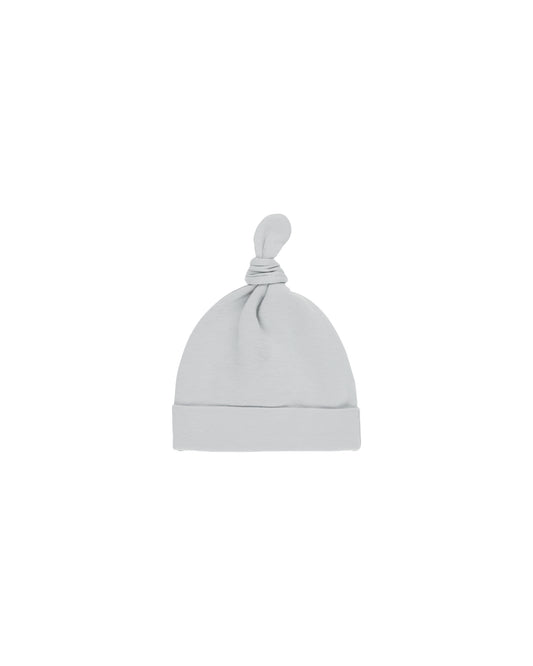 Sky knotted baby hat by Quincy Mae featuring soft fabric and a stylish knot design for cozy comfort.