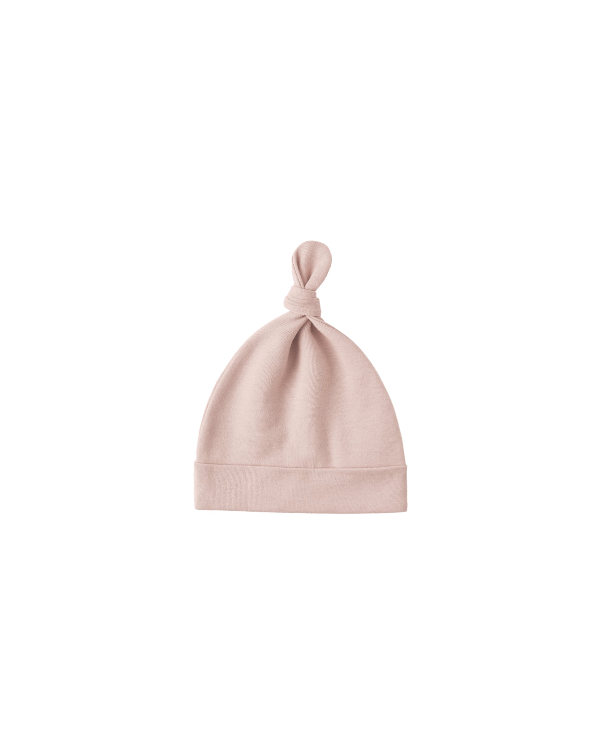 Soft blush-colored knotted baby hat by Quincy Mae, made for newborns and infants, featuring a cozy, stretchy fabric.