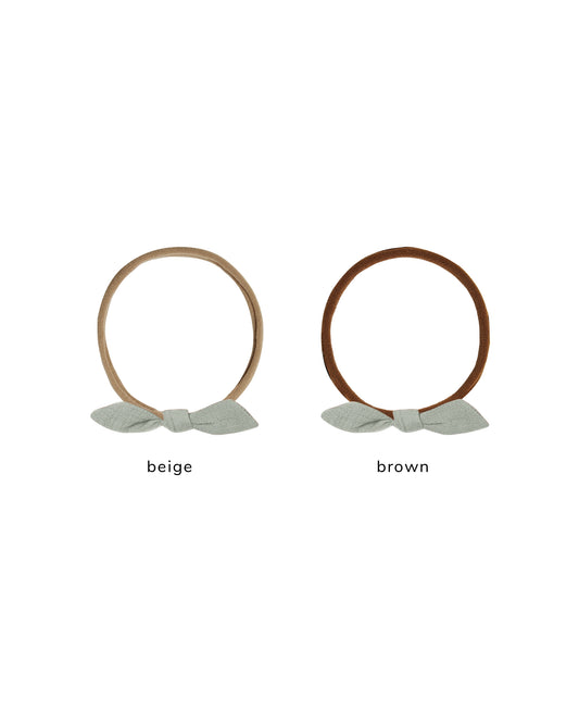 Sage Little Knot Headband by Quincy Mae featuring a soft fabric knot and gentle sage color for baby or toddler accessories.