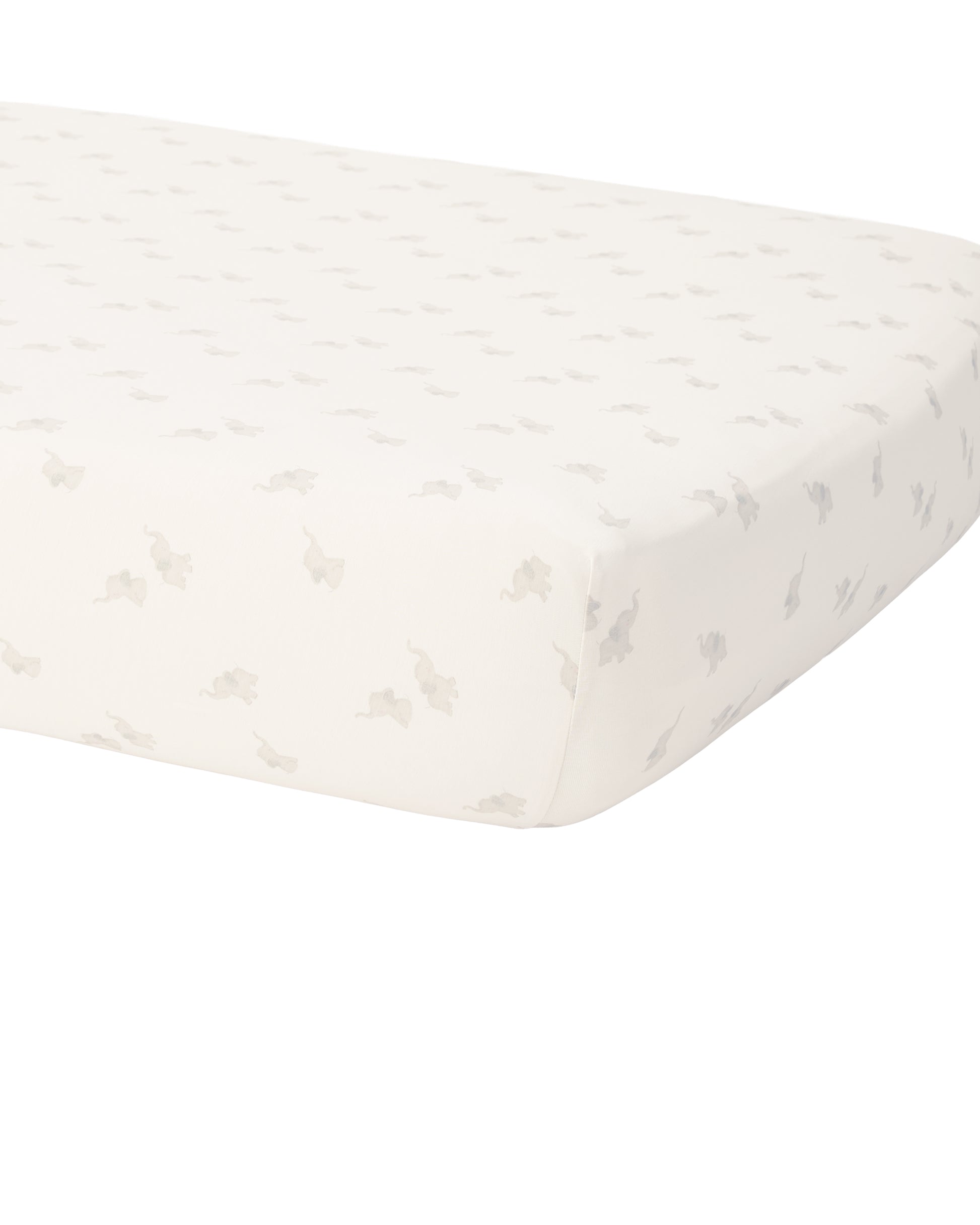 Natural bamboo crib sheet with elephant print by Quincy Mae, featuring soft fabric and adorable elephant pattern for baby's crib.