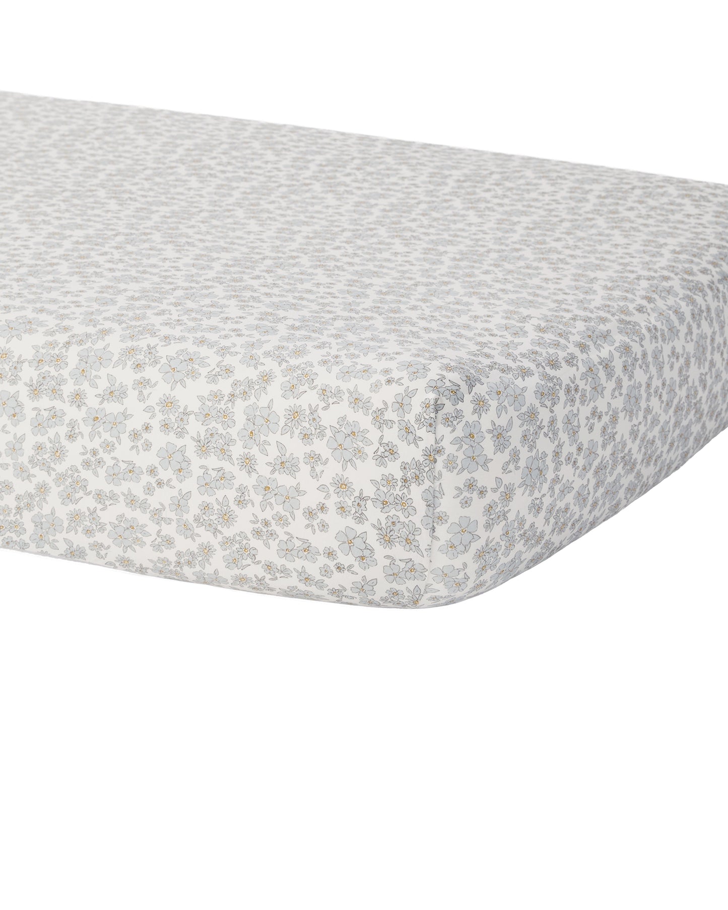 Blue floral bamboo crib sheet by Quincy Mae featuring a soft fabric with a delicate floral pattern on a light background.