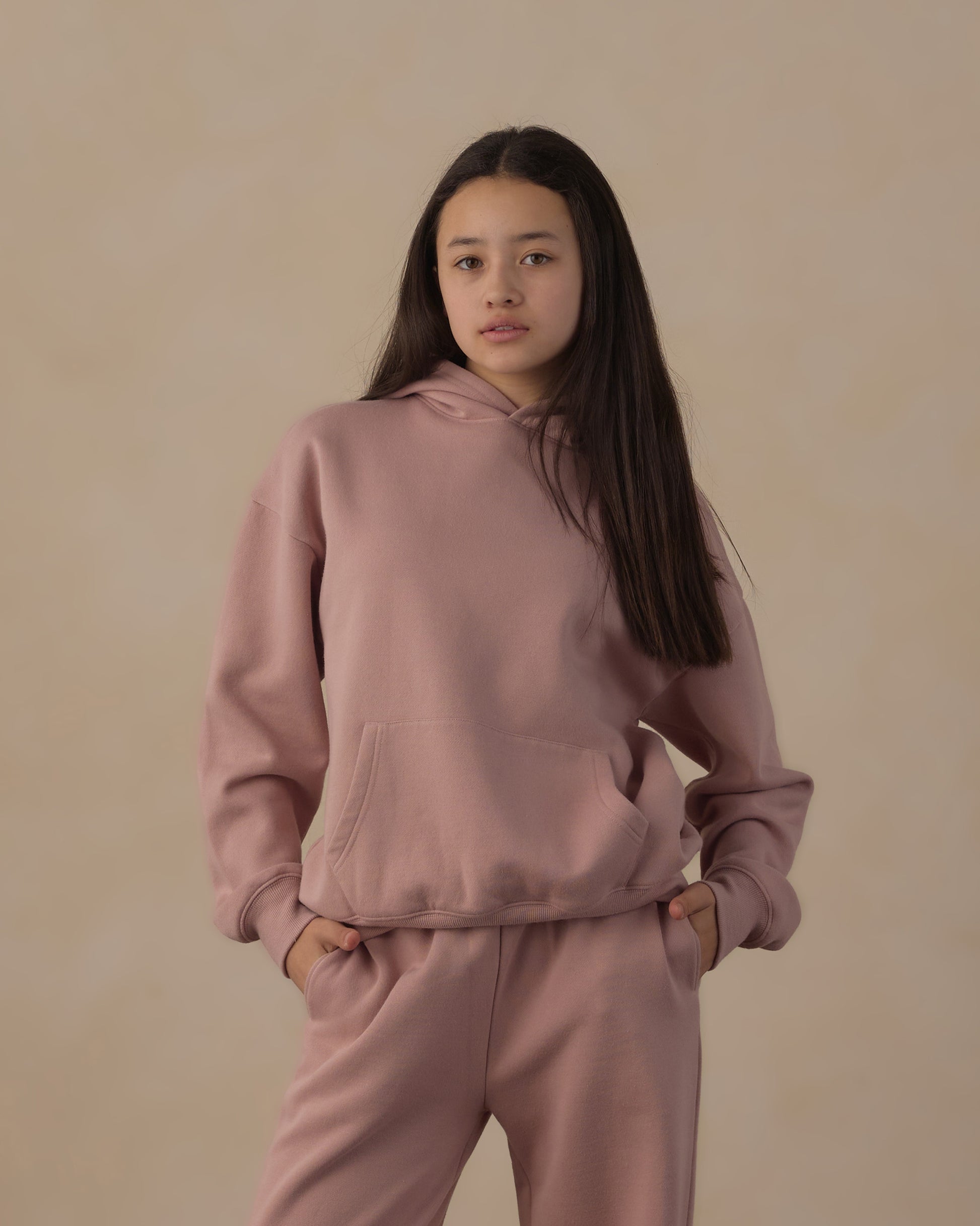 Teen Rosewood Relaxed Hoodie by Rylee & Cru, soft pink hoodie with a relaxed fit and ribbed cuffs displayed on a model.