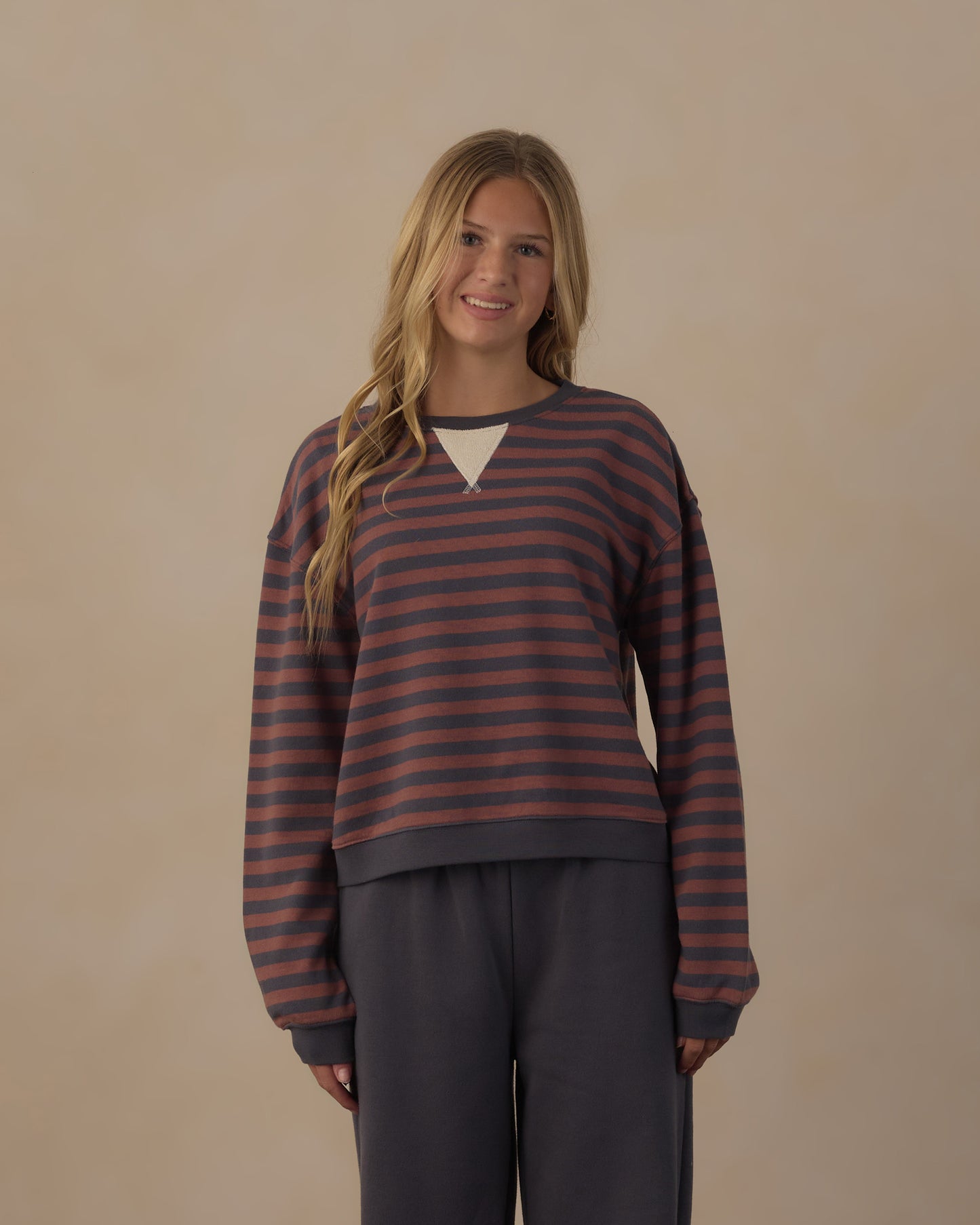 Teen oversized crew sweatshirt with multicolored Mulberry stripes by Rylee & Cru, shown on a hanger.