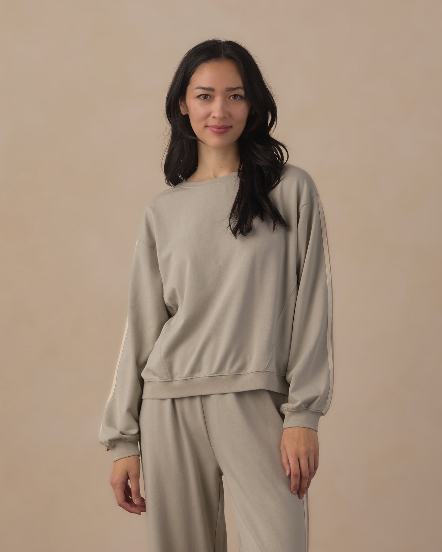 Women's oversized sage sweatshirt by Rylee & Cru, showing a relaxed fit with long sleeves and soft fabric on a plain background.