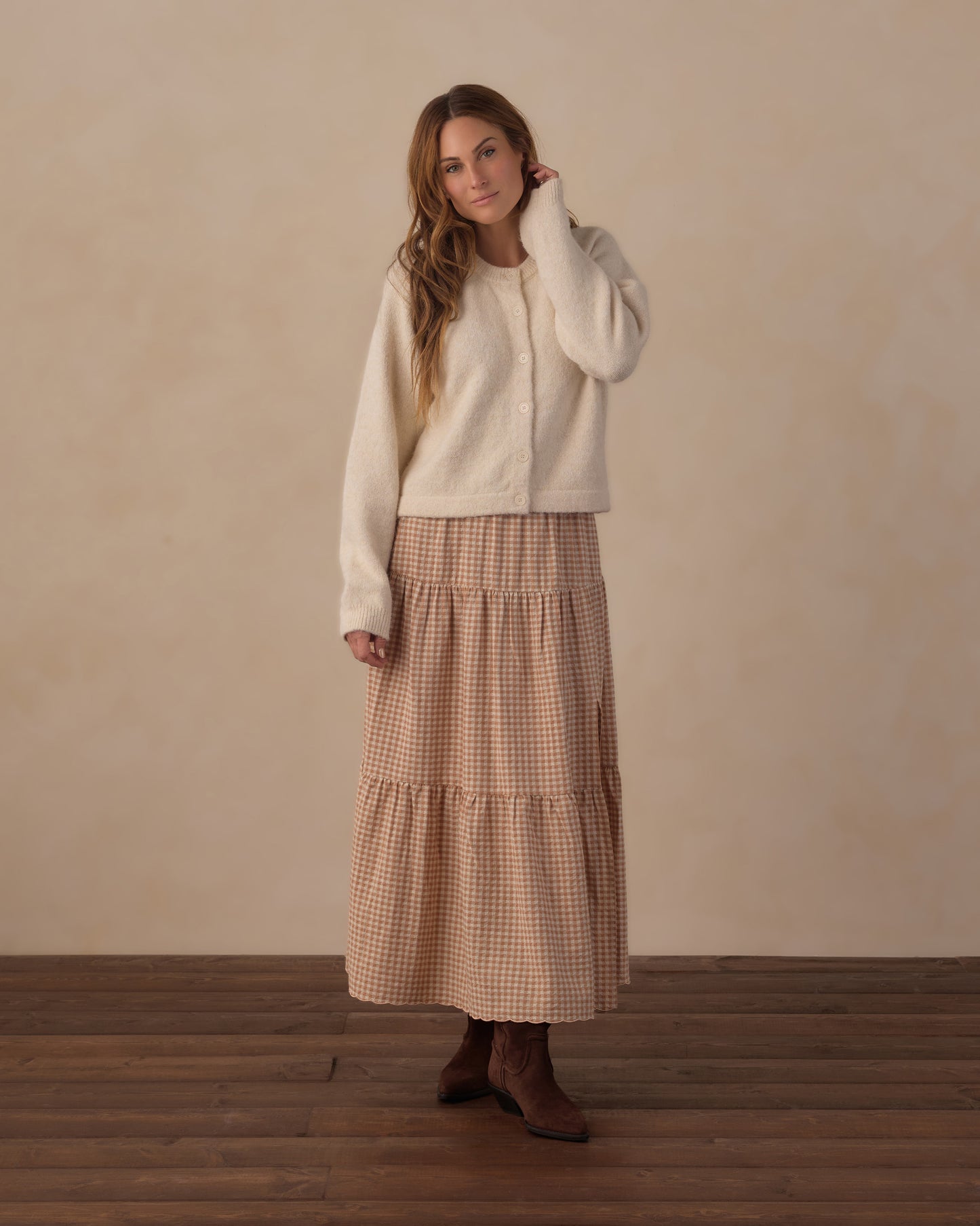 Women’s fuzzy cardigan by Rylee & Cru, cozy natural-textured knit with long sleeves and a relaxed fit, draped on a hanger.