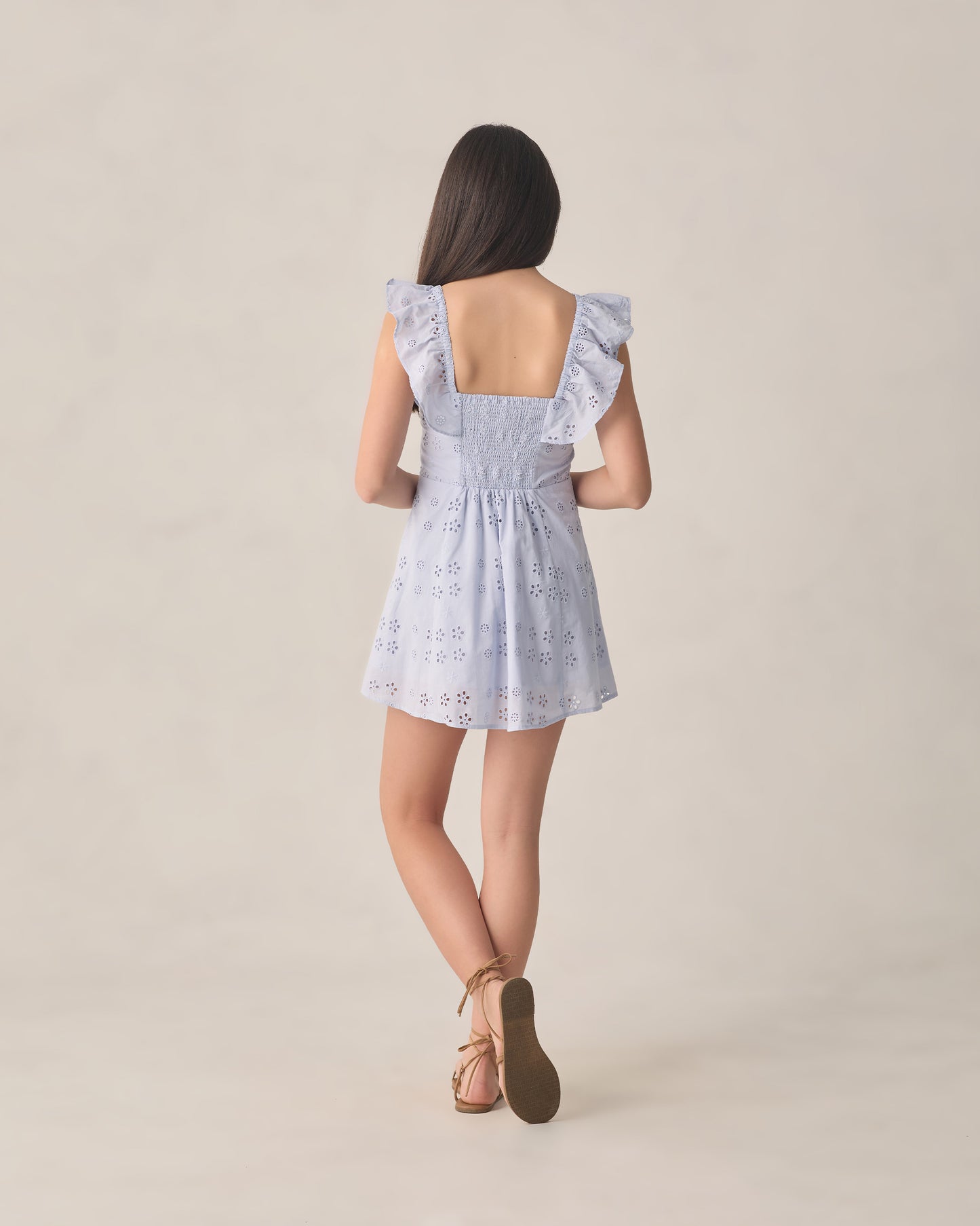 Teen periwinkle Bianca mini dress by Rylee & Cru, featuring a flowy design and adjustable straps on a model.