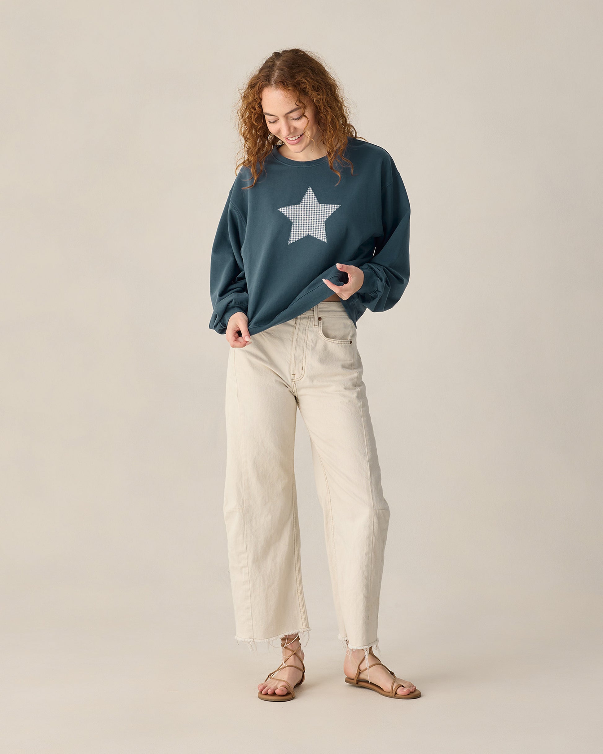 Women's navy Pier sweatshirt by Rylee & Cru featuring a cozy, casual fit and soft fabric, shown on a model.