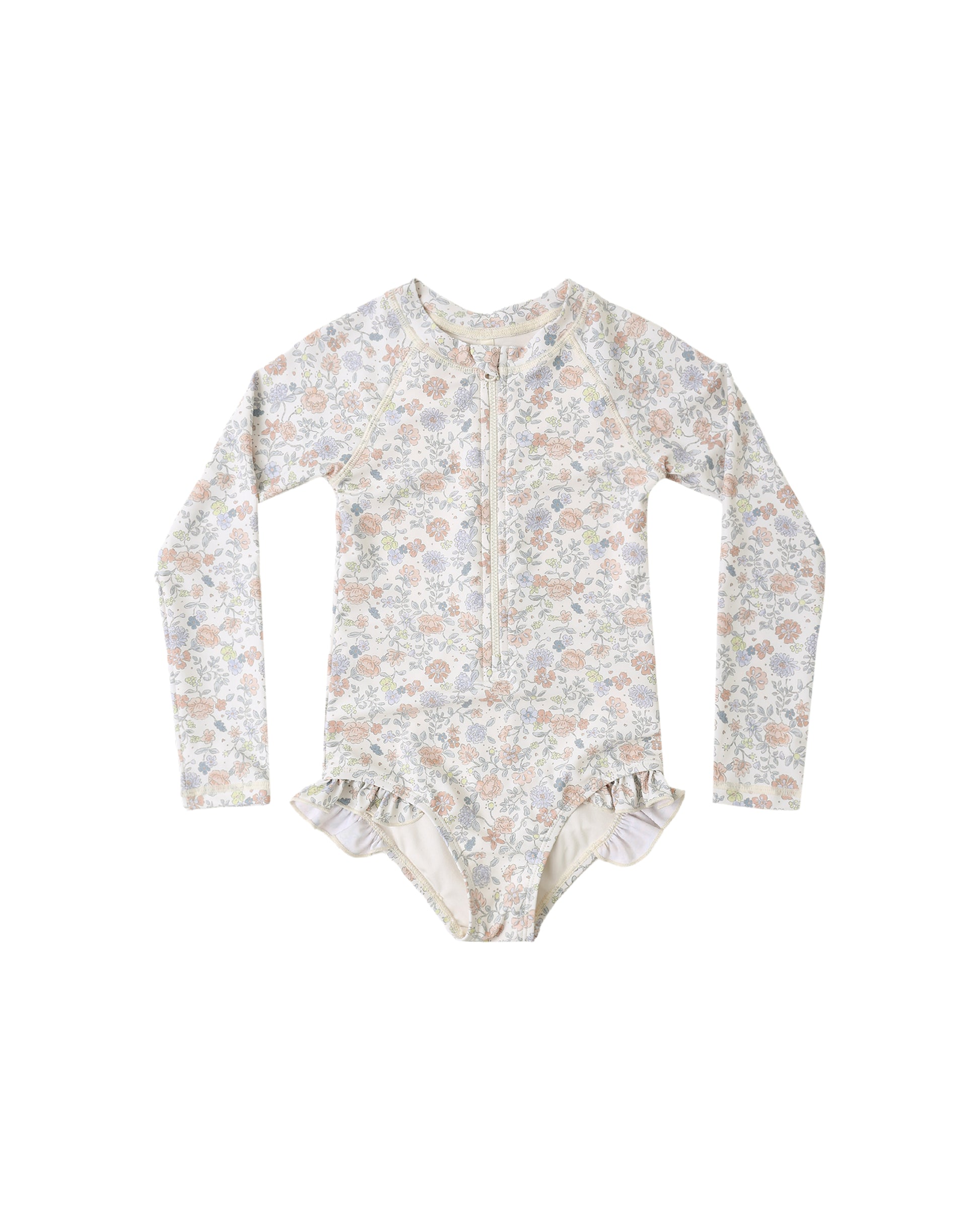 Rylee & Cru Bloom Rashguard One Piece in ivory, featuring a floral design and long sleeves for sun protection.