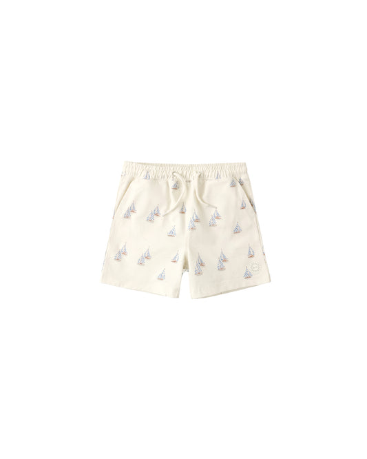 Rylee & Cru Sail Boardshort in natural color, showcasing lightweight fabric and casual fit with elastic waistband and side pockets.