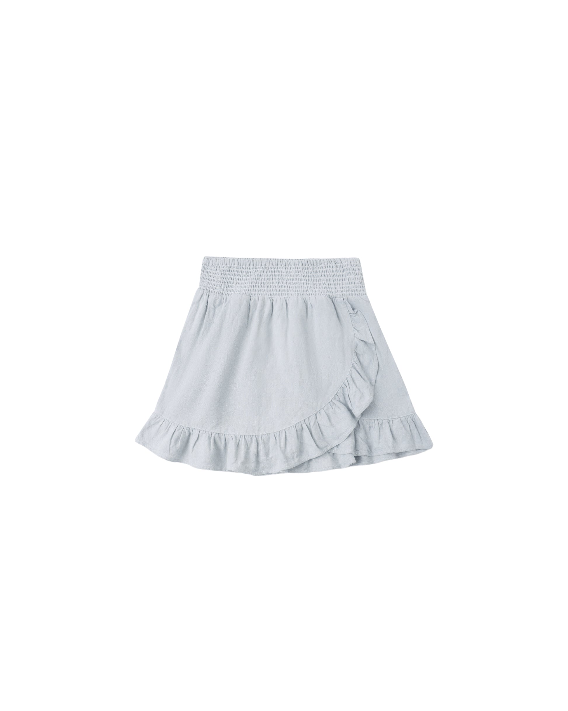 Heathered light blue wrap ruffle skirt by Rylee & Cru, showing the flowing fabric and stylish ruffle details.