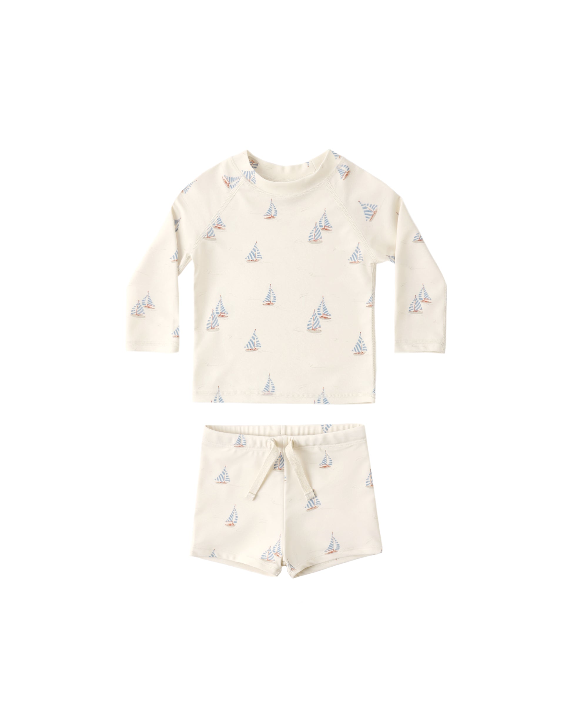 Rylee & Cru Sail Boys Rashguard Set in natural color, featuring long sleeves, soft fabric, and playful maritime design.