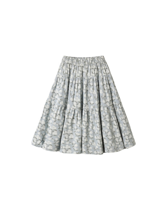 Light blue tiered mini skirt by Rylee & Cru displayed flat with ruffled layers and elastic waistband.