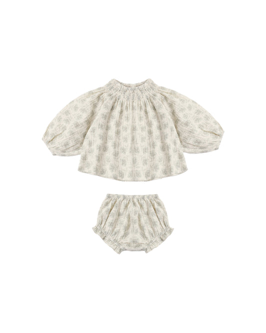 Green Iris Quincy set by Rylee & Cru featuring a soft, natural fabric with detailed iris embroidery on baby clothing.