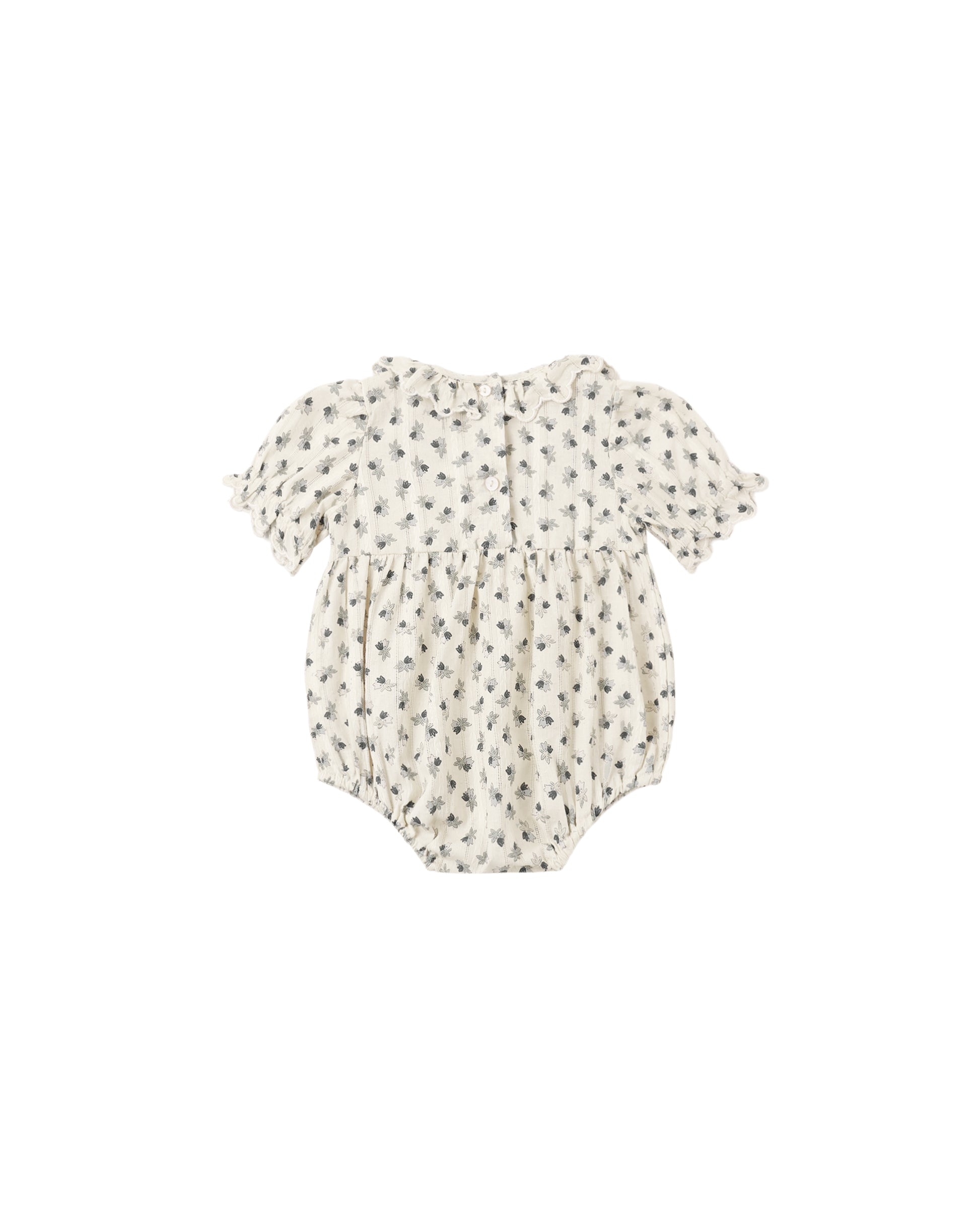 Rylee & Cru Vintage Fleur Liv romper for girls, natural-colored, with floral pattern and soft fabric, displayed on a hanger.