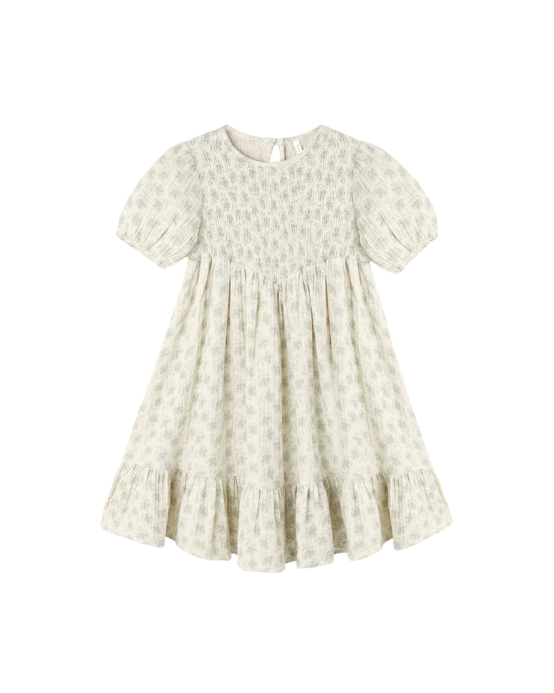 Green Iris Lydia Dress by Rylee & Cru, natural fabric with a flowing silhouette, shown on a hanger.