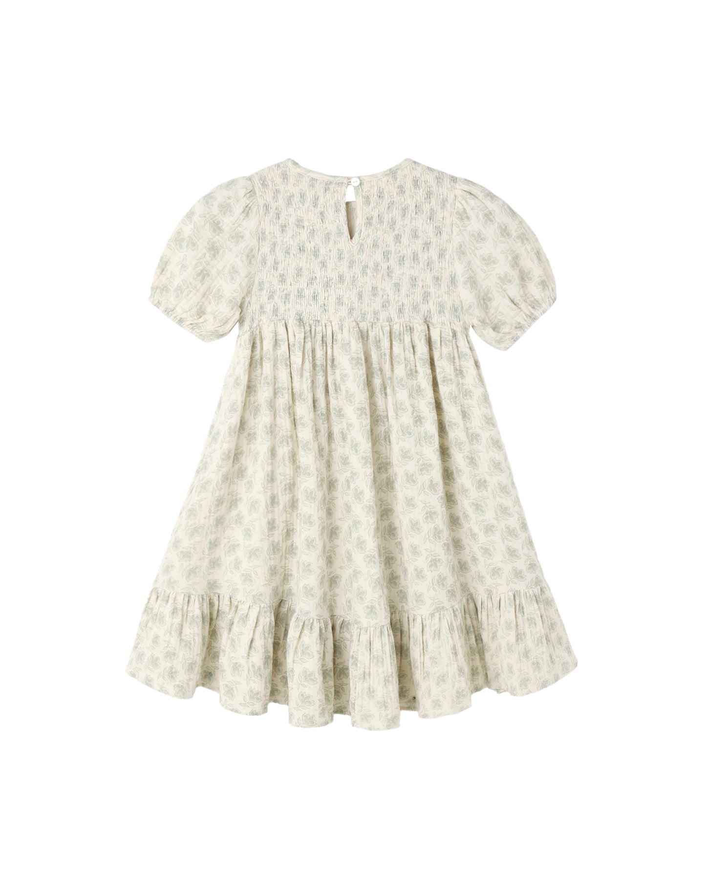 Green Iris Lydia Dress by Rylee & Cru, natural fabric with floral print, shown hanging on a wooden hanger.