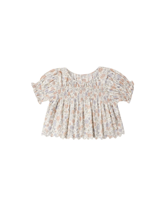 Rylee & Cru Bloom Colette Top in ivory, featuring soft fabric and stylish design, displayed on a hanger.