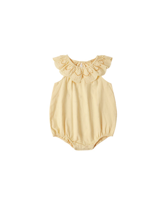 Rylee & Cru Lemon Myla romper with short sleeves and button details, featuring a bright yellow lemon print on soft fabric.