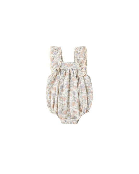 Rylee & Cru Bloom Maya romper in ivory, featuring soft fabric and a stylish design for infants or toddlers.