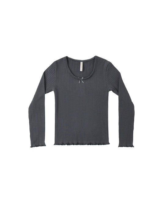 Rylee & Cru Midnight Ribbed Long Sleeve top, close-up of dark ribbed fabric and fitted long-sleeve design.