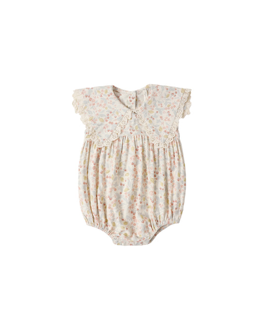 Rylee & Cru Summer Garden Porter Romper in ivory, featuring floral print and sleeveless design for warm weather wear.