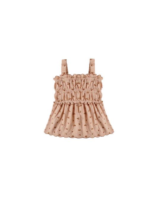 Cherry embroidery smocked tank top by Rylee & Cru featuring colorful cherry embroidery and a smocked neckline, melon color fabric.