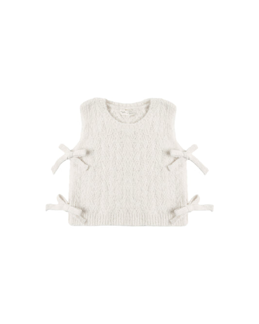 Ivory bow sweater vest by Rylee & Cru featuring a knitted design and a decorative bow at the front.