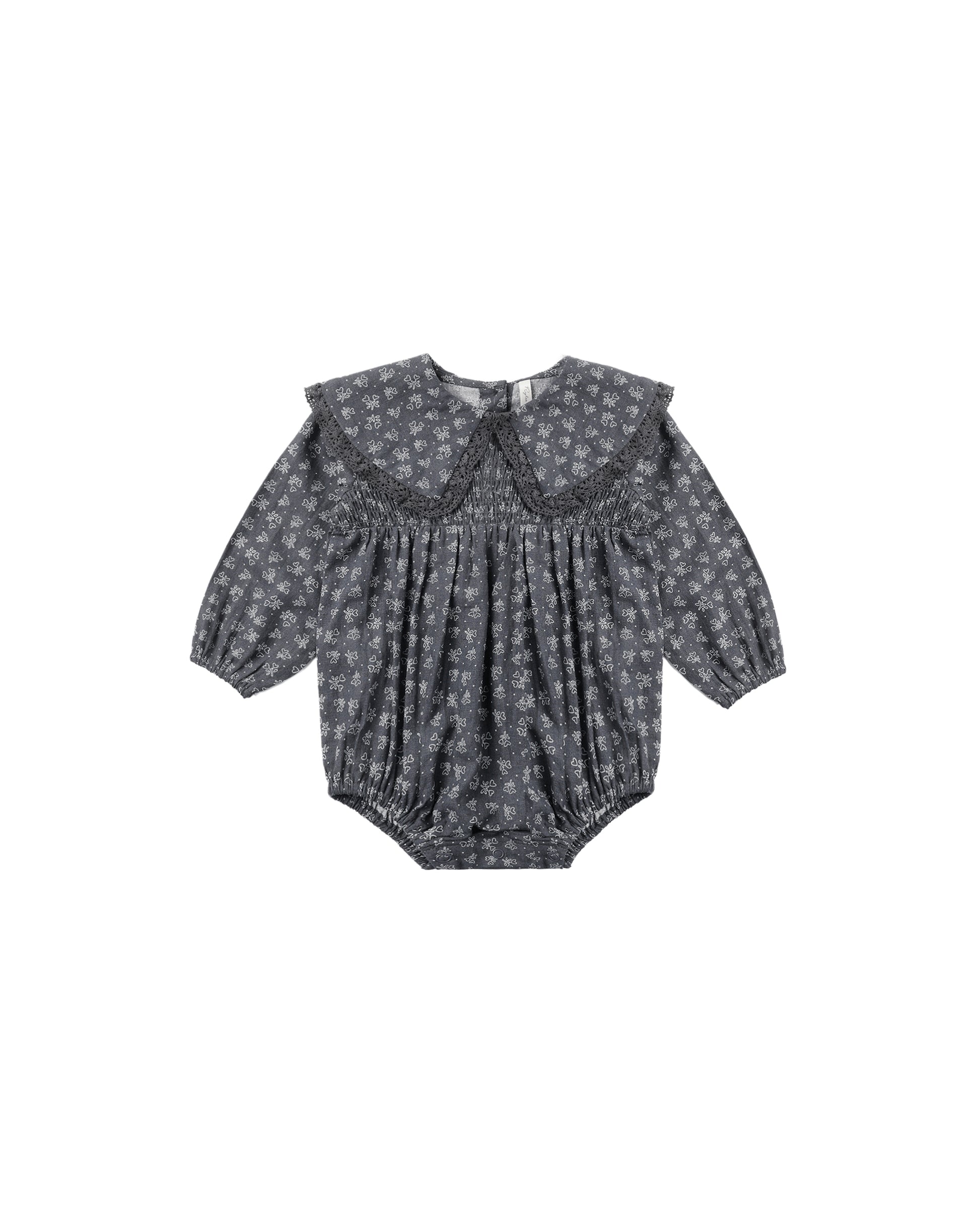 Rylee & Cru Heart Ditsy Fern romper in midnight, featuring a playful floral print and comfortable fabric for casual wear.