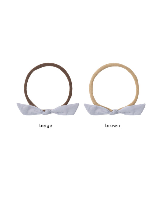 Periwinkle little knot headband by Rylee & Cru, featuring a soft fabric and a stylish knot design for infants.