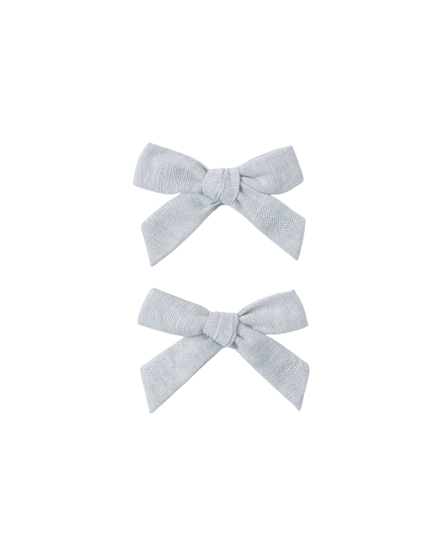 Set of two light blue heathered bows from Rylee & Cru, featuring soft fabric and a classic hair accessory design.
