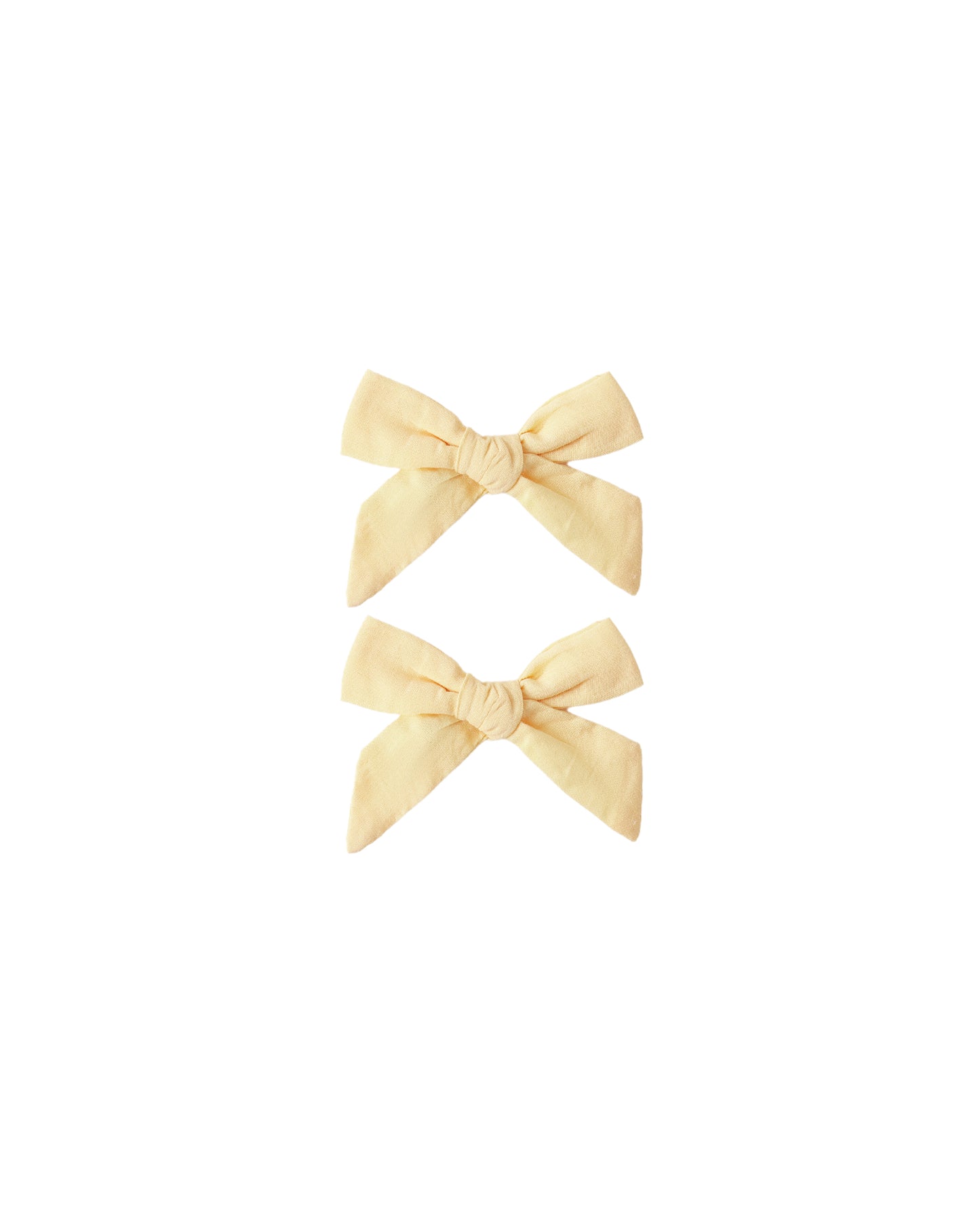 Set of two Rylee & Cru Lemon Bows featuring bright yellow lemon patterns on fabric hair accessories.