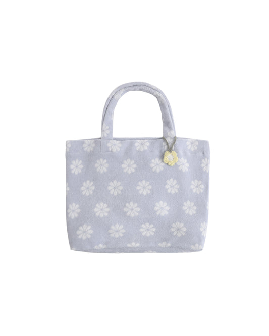 Periwinkle Daisy Terry beach bag by Rylee & Cru, featuring woven fabric with floral daisy pattern and sturdy handles.