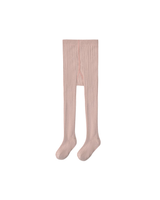 Rosewood ribbed tights by Rylee & Cru featuring a close-up of the textured, stretchy fabric on a model's legs.