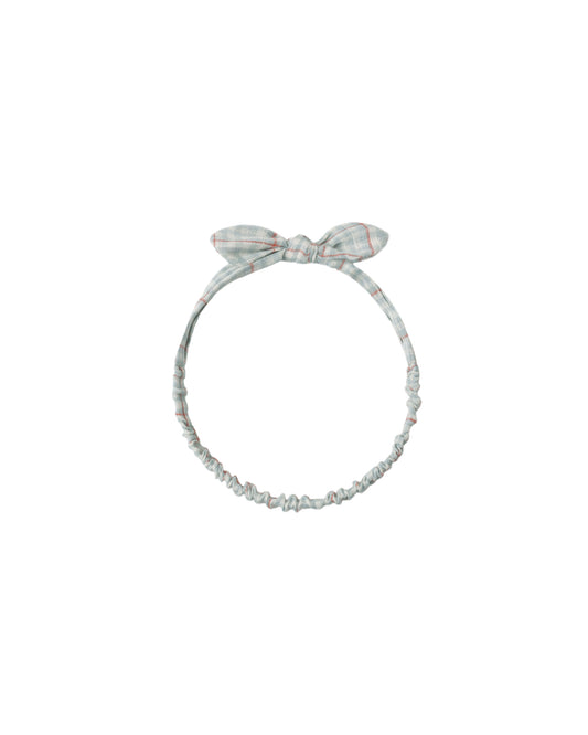 Light blue plaid baby bow headband by Rylee & Cru, featuring a soft fabric bow on a stretchy headband.