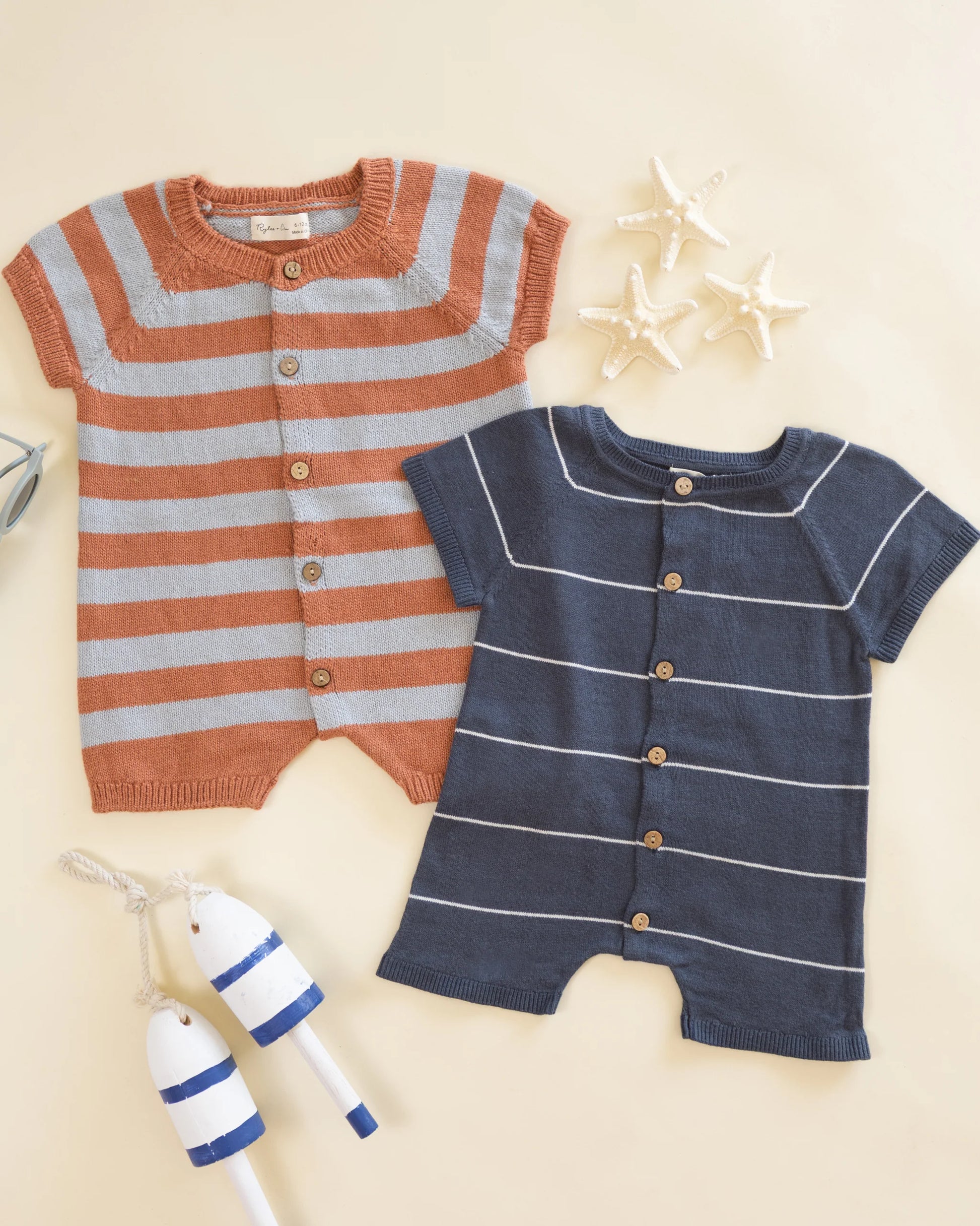 Navy stripe Liam knit romper by Rylee & Cru featuring long sleeves and a relaxed fit, perfect for comfortable casual wear.