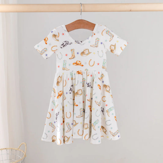Nola Tawk Rodeo Ready organic cotton dress in a stylish rodeo print, featuring a flowing design and lightweight fabric.