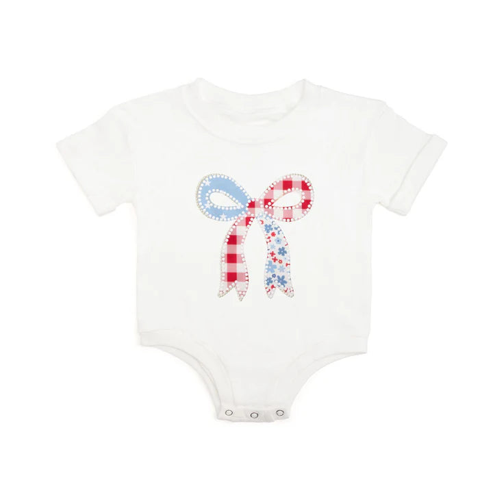 White patchwork bow patch short sleeve romper by Sweet Wink, featuring a cute design with patchwork details and a bow accent.