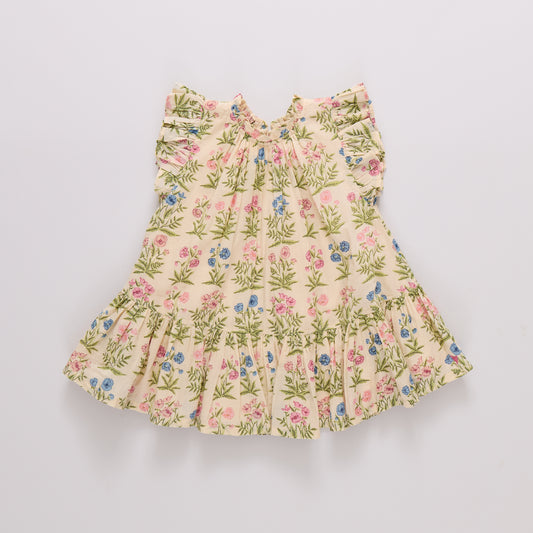 Bright pink girls' Harper dress with leafy floral pattern by Pink Chicken, featuring a ruffled neckline and sleeveless design.
