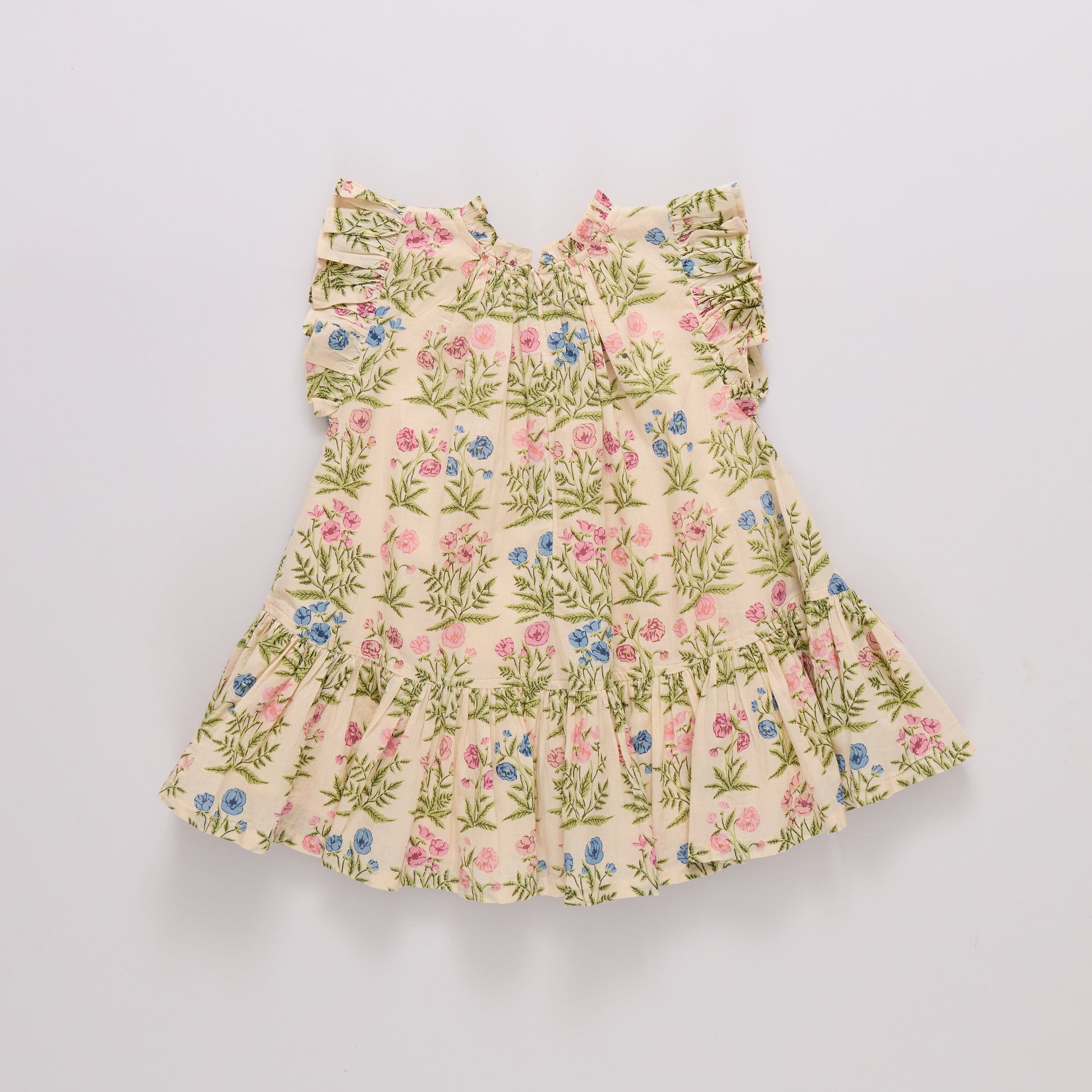 Girls' leafy floral Harper dress by Pink Chicken featuring a vibrant floral pattern and lightweight fabric.