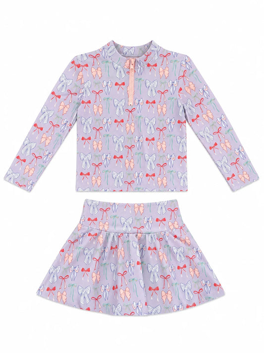 Lavender Bow Sarah Set by Hollis Baker featuring a charming lavender bow hair accessory and matching headband for children.