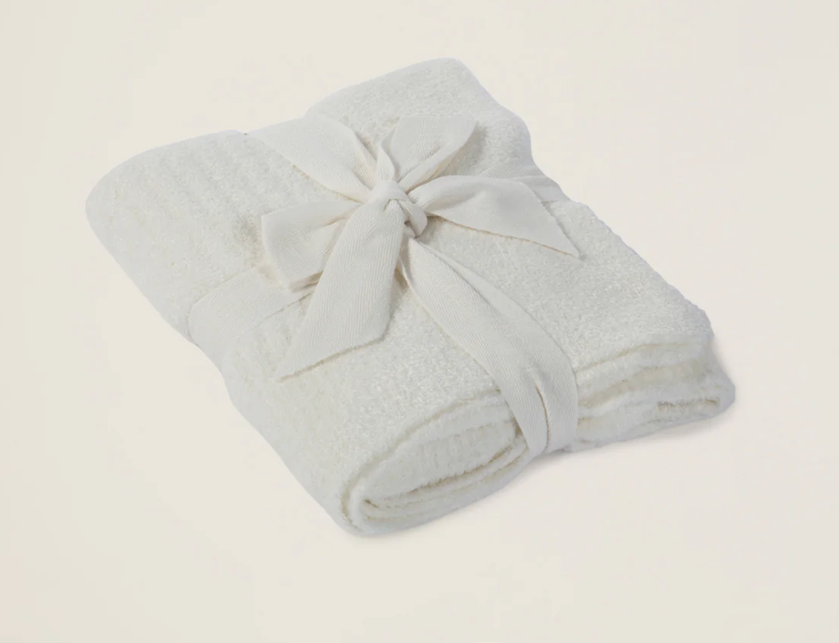 Barefoot Dreams Cozychic Lite ribbed baby blanket in Pearl, soft and cozy for infants, shown in a close-up image.